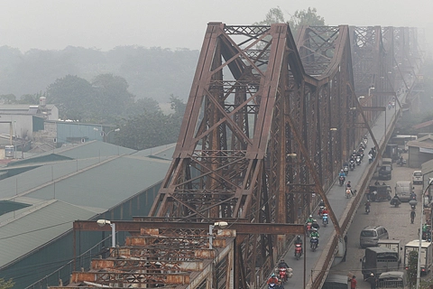 Severe air pollution lingers in Hanoi on December 24