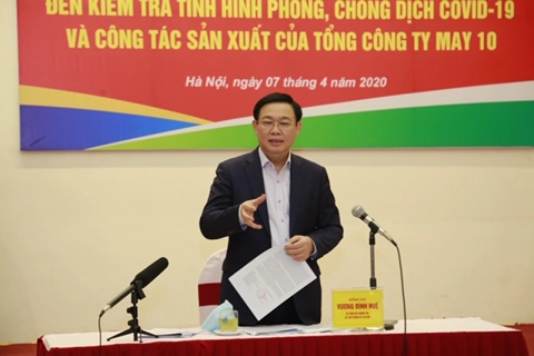 Hanoi Party chief lauds apparel maker's adaptability in mitigating Covid-19