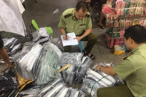 Vietnam authorities seize nearly 1 million poor quality face masks