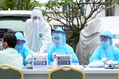 Hanoi rushes to test all returnees from Danang soon