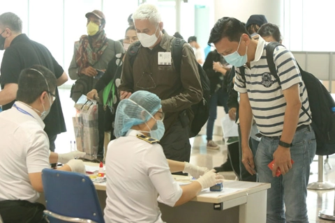Vietnam welcomes foreigners but closely eyes Covid-19 infection risk