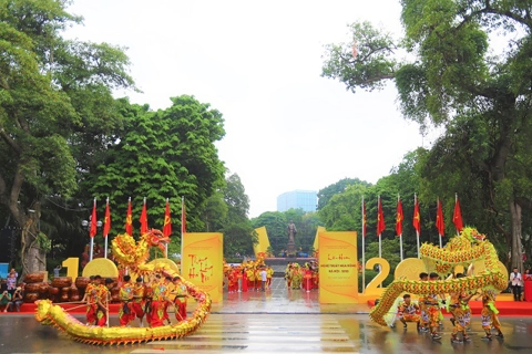 Hoan Kiem lake pedestrian space bustling with Dragon Dance Festival