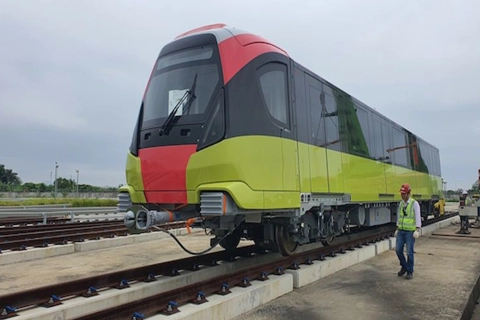 Close-up of first train of Hanoi’s second metro line put on rails