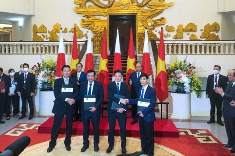 Japan, Vietnam firms ink billion-dollar gas power projects during Suga's visit