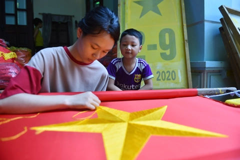 A busy time for old flag making village in Hanoi