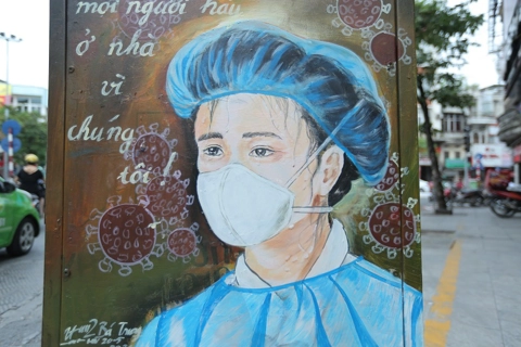 Transformer booths in Hanoi decorated with anti-Covid-19 paintings