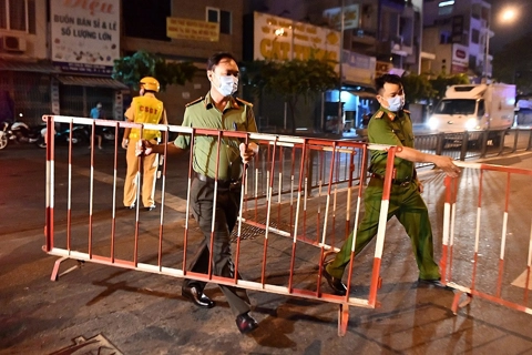 What should Ho Chi Minh City do in 15-day partial lockdown?