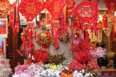 Red color brings “Tet excitement” to Hanoi’s downtown street