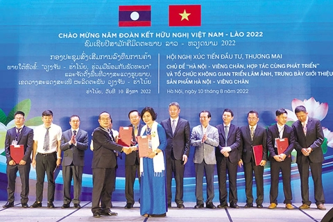 Hanoi – Vientiane bolster economic ties