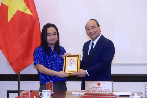 President applauds boy for translating The Tale of Kieu