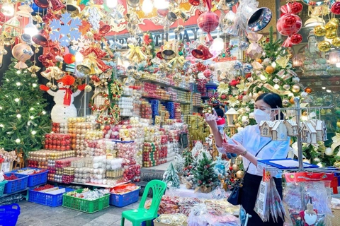 Hanoi’s Old Quarter streets sparkle and bustle ahead of Christmas