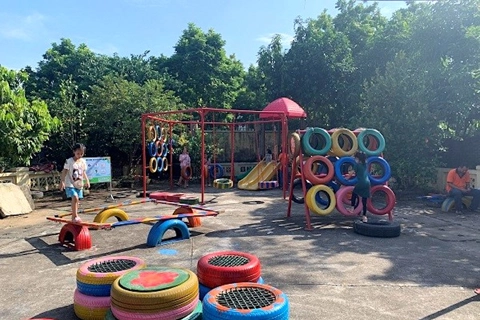 Hanoian children enjoy recycled playgrounds