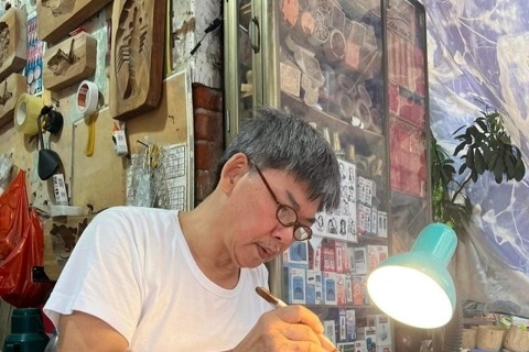 A Hanoi artisan creates woodblock for over four decades