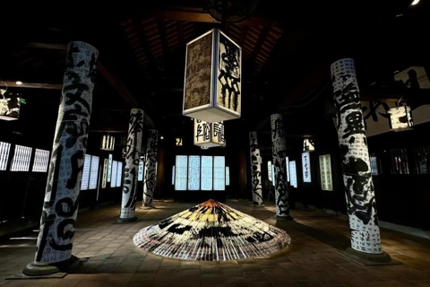 Exhibition shows calligraphy combined with light installation