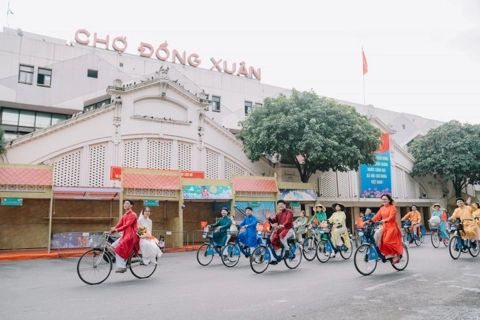 Designers and artisans working together to promote traditional ao dai