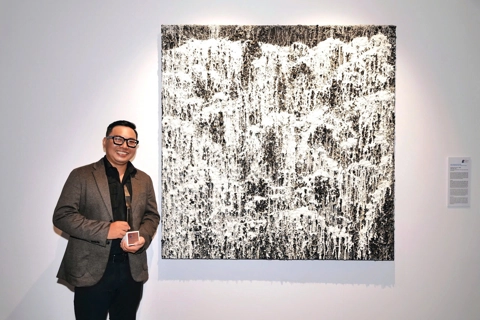 Coal and rice artwork on canvas wins international painting contest