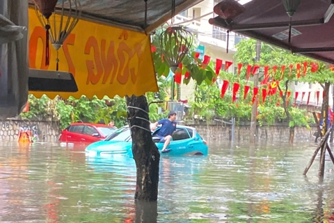 Hanoi streets submerged after heavy rains